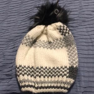 New , never worn Pom Pom hat. Made in Italy, Dey clean only